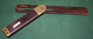 Ebony T Bevel With Brass Ends 9", Some Pitting On Blade.