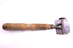 Vintage patented scraper, unusual design