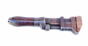 P S & W 7" Vintage Wrench With Timber Handle.