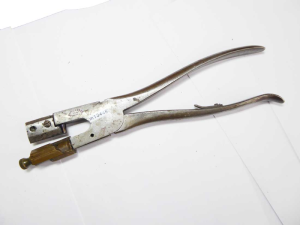 Vintage button hole cutting pliers with maker