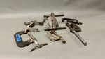 Seven Assorted Clamps Largest Is 60mm